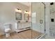 Modern bathroom featuring a dual sink vanity and a walk-in glass shower at 5139 50Th W Ave, Bradenton, FL 34210