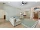 Open living area featuring tile floors, natural light, and seamless flow to the kitchen at 5139 50Th W Ave, Bradenton, FL 34210