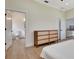 Bedroom showcasing a dresser with access to the bathroom and another room at 5139 50Th W Ave, Bradenton, FL 34210