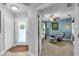 Inviting foyer with light-filled entry, stylish decor, and tile flooring at 529 Sunset N Rd, Rotonda West, FL 33947