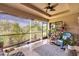 Tranquil screened patio featuring stylish decor, comfortable seating, and peaceful ambiance at 529 Sunset N Rd, Rotonda West, FL 33947