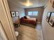 Cozy bedroom with a comfortable bed and ample natural light at 5316 Chateau Ln, Bradenton, FL 34207