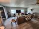 Cozy living room with plank flooring, natural light, and neutral color palette at 5316 Chateau Ln, Bradenton, FL 34207