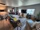 Comfortable living room with modern furniture and abundant natural light at 5316 Chateau Ln, Bradenton, FL 34207