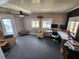 Comfortable office space with ample light, desk setup, and cozy seating, perfect for remote work at 5316 Chateau Ln, Bradenton, FL 34207