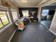 Bright home office with natural light, desk, and neutral decor creating a productive workspace at 5316 Chateau Ln, Bradenton, FL 34207