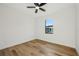 Bedroom with natural light, ceiling fan and wood floor at 5386 Easter Ter, North Port, FL 34286