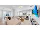 Comfortable living room with large sectional, contemporary decor, and a view of the backyard at 6120 115Th E Ave, Parrish, FL 34219
