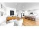 Bright living space featuring hardwood floors, modern decor, and an open floor plan at 6120 115Th E Ave, Parrish, FL 34219