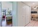Hallway leading into a bedroom and dining room at 618 Bird Bay S Dr # 113, Venice, FL 34285