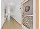 Inviting hallway leading to a unit entrance at 618 Bird Bay S Dr # 113, Venice, FL 34285