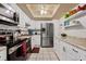 Modern kitchen featuring stainless steel appliances and granite countertops at 618 Bird Bay S Dr # 113, Venice, FL 34285