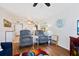 Comfortable living room featuring hardwood floors and plenty of seating space at 618 Bird Bay S Dr # 113, Venice, FL 34285