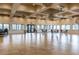 Spacious meeting room with tiled floors, ample windows, and modern lighting at 618 Bird Bay S Dr # 113, Venice, FL 34285