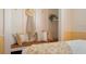 Bedroom nook featuring a wooden bench, pillows, and unique wall decor at 6180 42Nd N Ave, St Petersburg, FL 33709