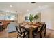 A dining room is adjacent to the living area, creating an open flow, perfect for entertaining at 6180 42Nd N Ave, St Petersburg, FL 33709