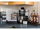 Coffee station with Keurig, pods, syrups, and countertop space at 6180 42Nd N Ave, St Petersburg, FL 33709