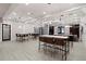 A large amenity space with communal tables and chairs for gathering and socializing at 6256 Springmont Loop, Palmetto, FL 34221