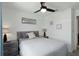 Inviting bedroom with a gray bed, neutral walls, and stylish bedside tables at 6256 Springmont Loop, Palmetto, FL 34221