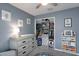 This bedroom features ample closet space and a gray changing table with drawers at 6256 Springmont Loop, Palmetto, FL 34221