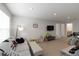 Bonus room offering multiple seating options and play area, maximizing Gathering entertainment at 6256 Springmont Loop, Palmetto, FL 34221
