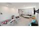 Spacious bonus room featuring a ' play area and cozy seating, perfect for Gathering time at 6256 Springmont Loop, Palmetto, FL 34221