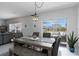 Dining area with access to screened patio, showcasing indoor/outdoor living at 6256 Springmont Loop, Palmetto, FL 34221