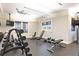 Bright fitness center with weights, benches, and ceiling fans at 6256 Springmont Loop, Palmetto, FL 34221