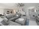 Spacious living room with an open layout and modern furnishings, perfect for entertaining at 6256 Springmont Loop, Palmetto, FL 34221