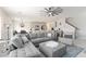 Spacious living room with an open layout and modern furnishings, perfect for entertaining at 6256 Springmont Loop, Palmetto, FL 34221