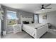 Comfortable main bedroom boasting an abundance of natural light and neutral decor at 6256 Springmont Loop, Palmetto, FL 34221