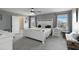 Main bedroom showcasing natural light, ensuite bathroom, and gray walls at 6256 Springmont Loop, Palmetto, FL 34221