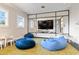 entertainment space with comfy beanbag chairs and tv at 6256 Springmont Loop, Palmetto, FL 34221