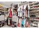Custom walk-in closet design with shelves, drawers, hanging racks, and organization solutions for clothes and shoes at 6256 Springmont Loop, Palmetto, FL 34221