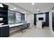 A modern workspace with built-in desks, natural light, and ample storage at 6256 Springmont Loop, Palmetto, FL 34221