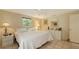 Bright bedroom with neutral walls, a large window, and tile flooring throughout at 626 46Th St, Sarasota, FL 34234