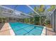 Inviting pool surrounded by lush landscaping, perfect for a relaxing swim at 626 46Th St, Sarasota, FL 34234