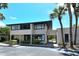 Charming two-story condo with well-maintained landscaping and convenient covered parking at 7214 Cloister Dr # 7214, Sarasota, FL 34231