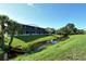 Beautiful condo with a serene water view from the private screened lanai and lush landscaping at 7214 Cloister Dr # 7214, Sarasota, FL 34231