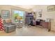 The office has lots of natural light from the window and a comfortable recliner at 7214 Cloister Dr # 7214, Sarasota, FL 34231