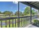 Scenic view from the screened porch overlooking the waterway and serene landscape at 7214 Cloister Dr # 7214, Sarasota, FL 34231