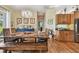 Elegant dining room with wood table, chandelier, and ample seating for Gathering and friends at 7264 Spencer Parrish Rd, Parrish, FL 34219