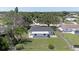 Backyard view featuring a lush lawn and chain link fence, offering privacy and space for outdoor activities at 7308 17Th W Ave, Bradenton, FL 34209