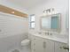 Bright bathroom featuring a vanity with storage, a stylish mirror, and a shower-tub combination at 7308 17Th W Ave, Bradenton, FL 34209