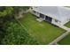 Spacious, well-manicured backyard with a vinyl fence, providing privacy and a serene outdoor space at 813 Oak Pond Dr, Osprey, FL 34229