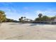 Sandy beach with boardwalk and shaded picnic areas at 813 Oak Pond Dr, Osprey, FL 34229