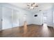 Open bedroom with wood floors and walk in closet at 813 Oak Pond Dr, Osprey, FL 34229