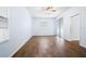 Bright bedroom with wood floors and sliding closet doors at 813 Oak Pond Dr, Osprey, FL 34229