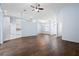 Bright, open living area features hardwood floors, high ceilings, and seamless flow to the dining space at 813 Oak Pond Dr, Osprey, FL 34229