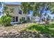 Sprawling backyard with screened-in porch and enclosed pool area at 815 Greenview Dr, Apollo Beach, FL 33572